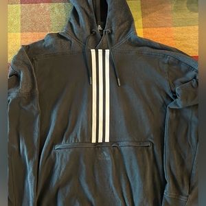 Adidas sweatshirt. Size L. Black and white. Zipper pocket in front.